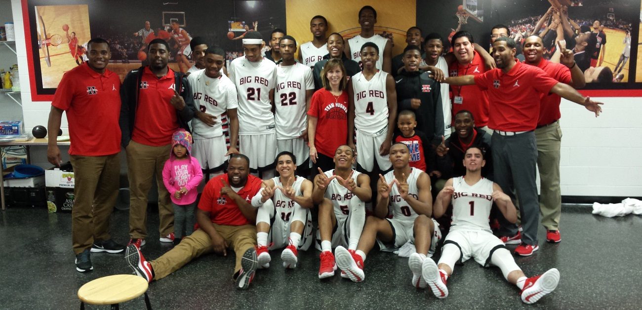 REALTOR® Kelly Whelan with the Hughes High School basketball team.