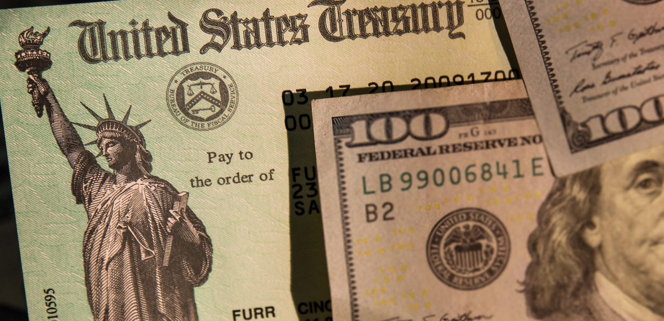 US Treasury check and money