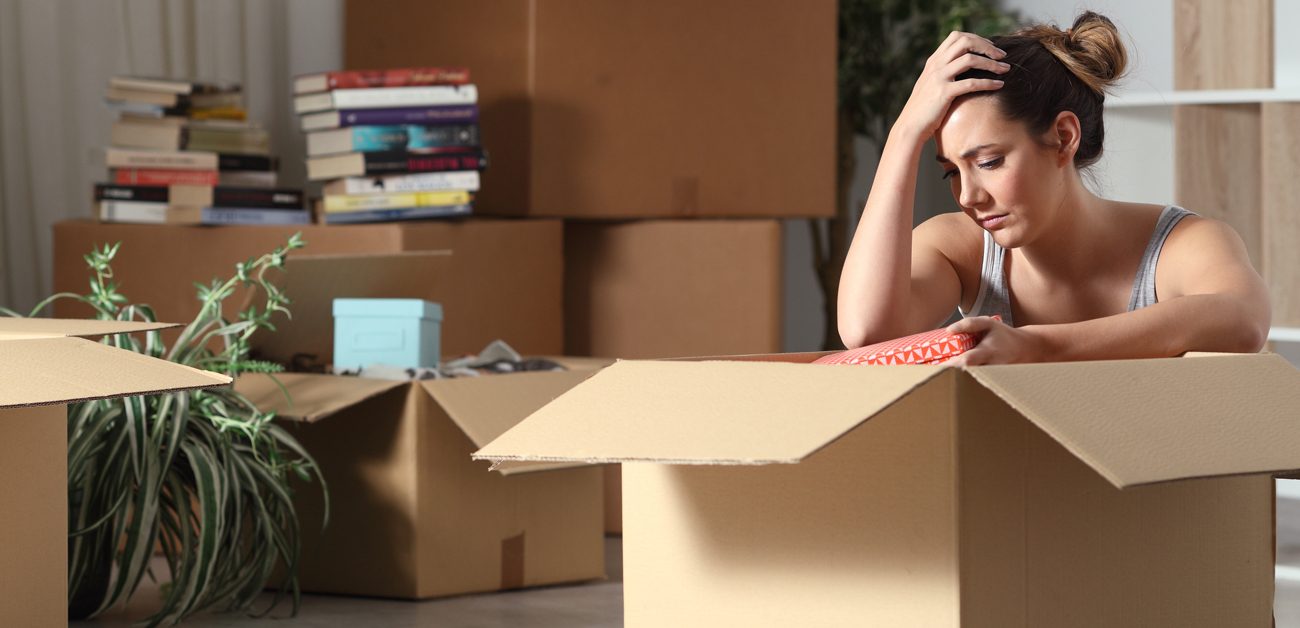 woman packing up apartment