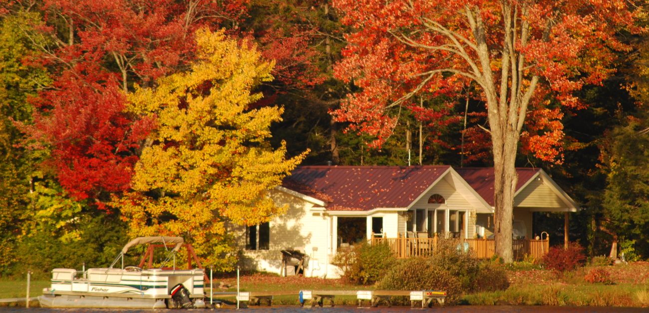 House with colorful trees in fall