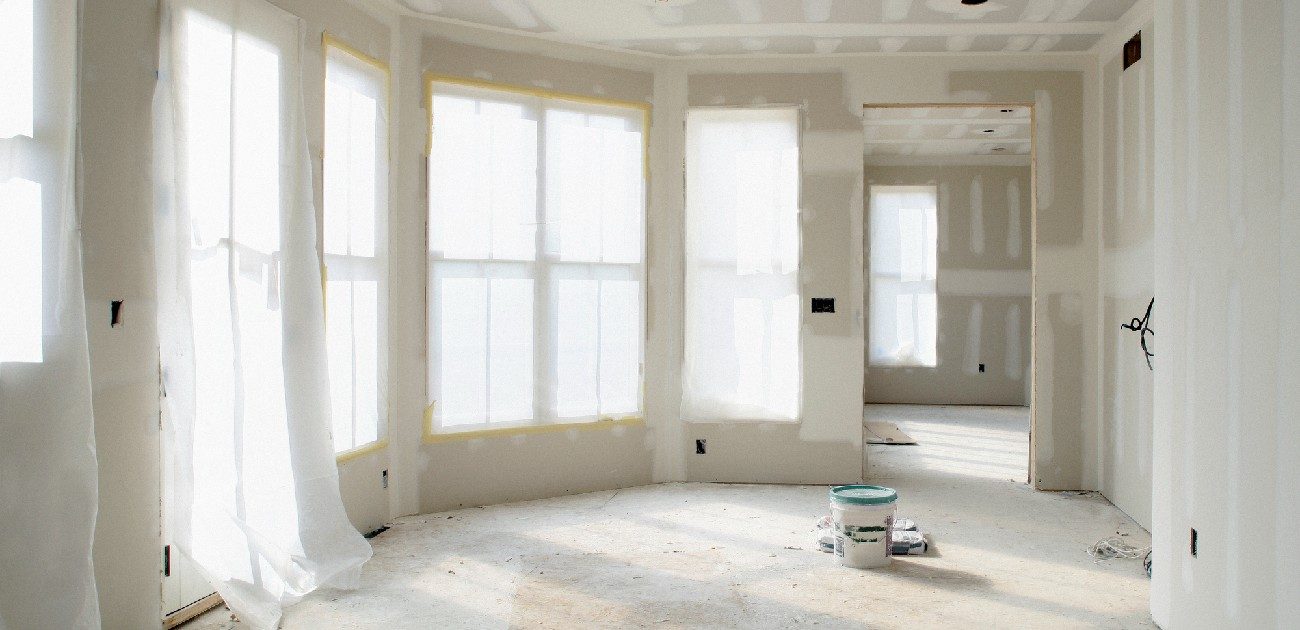 A picture of an empty room in a home being renovated.