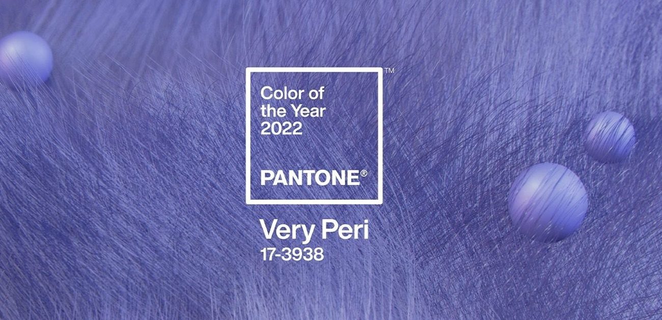 An illustration of paint strokes and spheres in the color "Very Peri," Pantone's 2022 color of the year