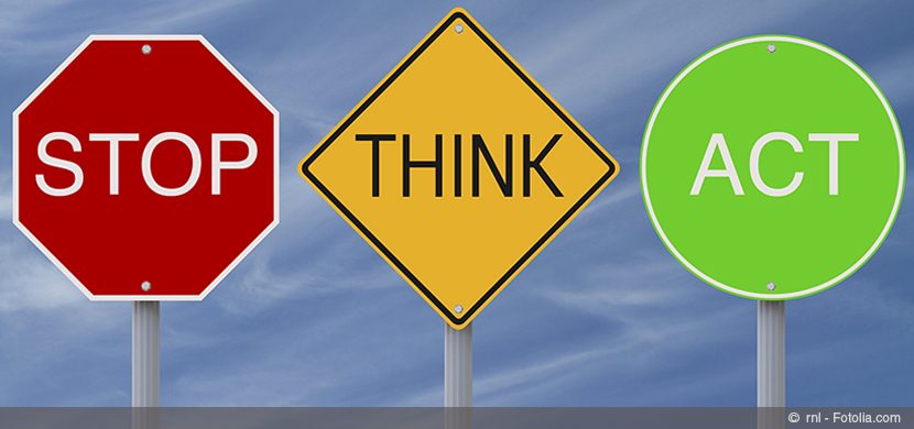 Signs indicating Stop Think and Act