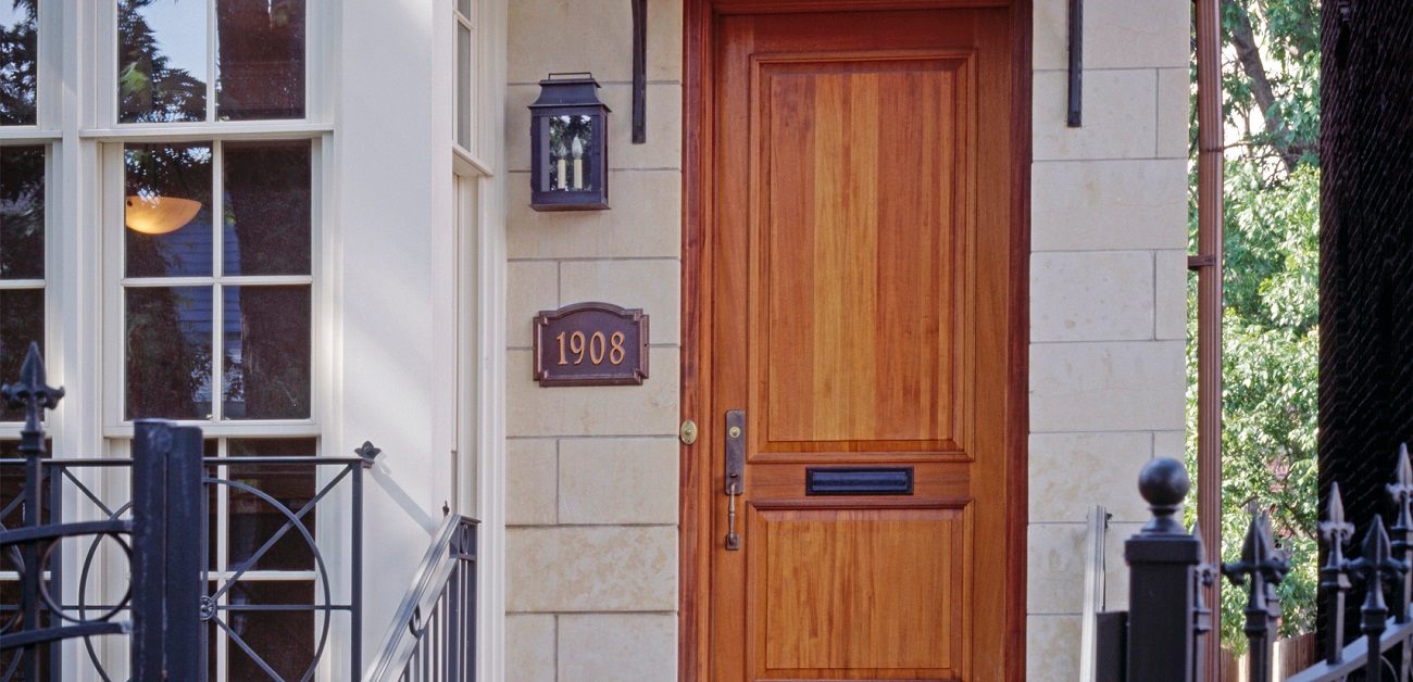 Address plaque next to door