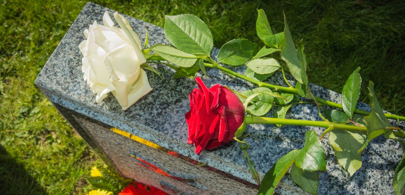 Roses on gravestone