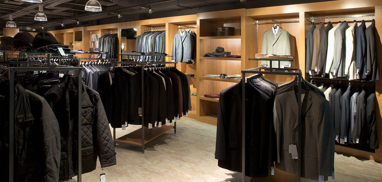 Racks of clothes in a menswear store
