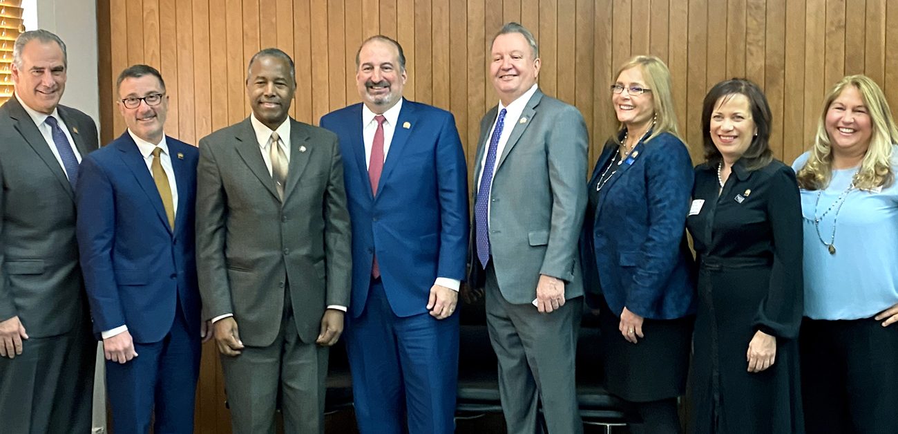President Malta, second from left, and other NAR leaders with Housing & Urban Development Secretary Ben Carson.