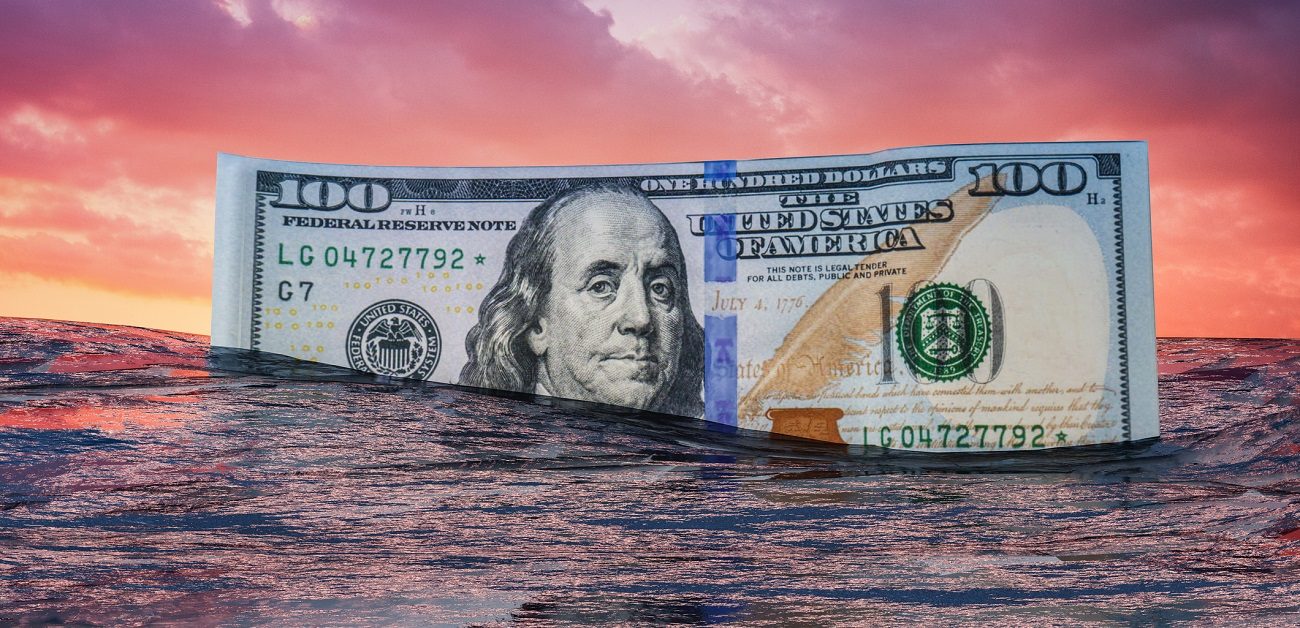 One hundred dollar bill underwater