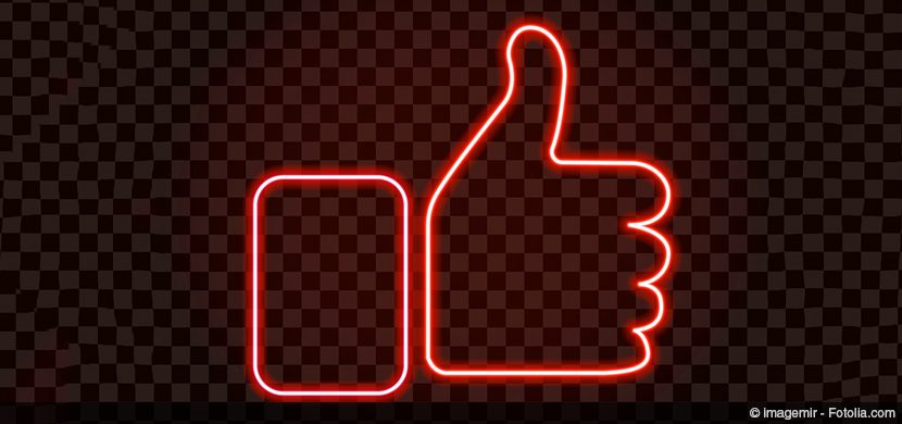 Thumbs up in red neon